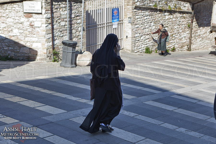 Nun on a cellphone